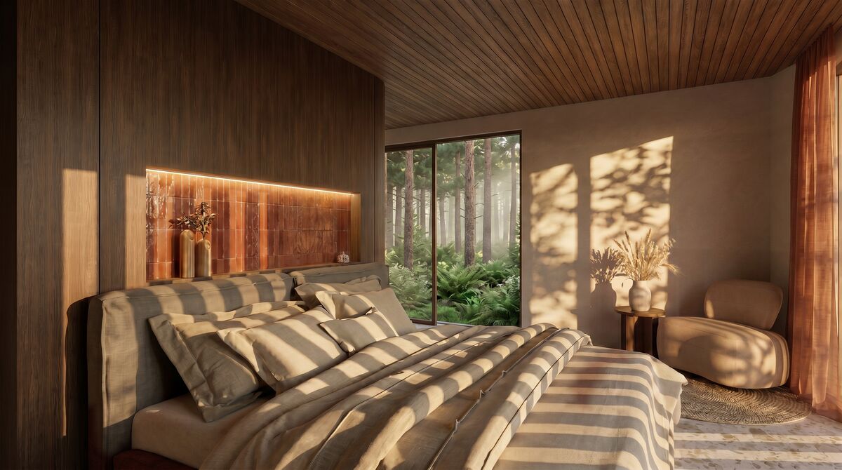 Slaapkamer met zicht op het bos